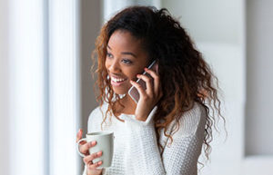 African Smerican woman on her cell phone